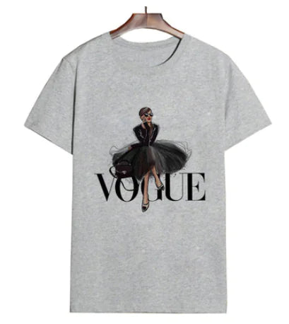 Chic grey oversized women's T-shirt featuring a stylish letter print design with 'VOGUE' and a fashionable illustration, ideal for casual elegance.