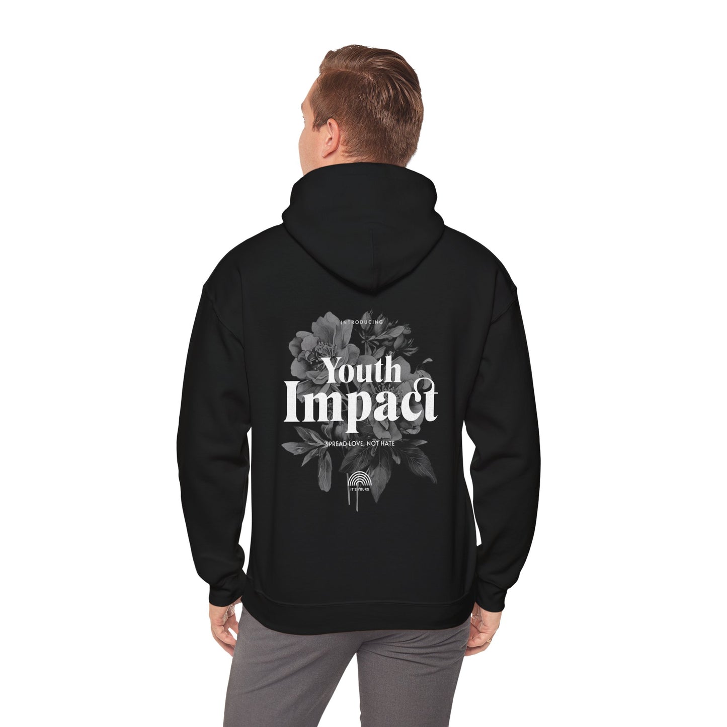 Man wearing Youth Impact Hoodie in black, displaying a striking floral design and impactful message, ideal for fashionable gatherings.