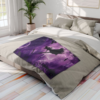 Elegant Decorative and Warm Halloween Spooky Arctic fleece blanket displayed on a tastefully styled bed, showcasing its beautiful purple artwork.