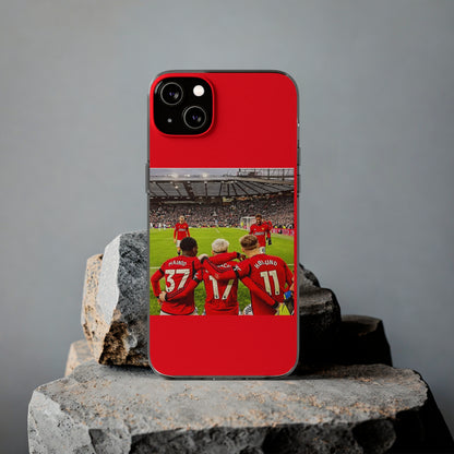 Manchester United Mainoo Garnach Hojlund Soft Phone Case showcasing a vibrant team celebration against a sleek background, ideal for passionate soccer fans.