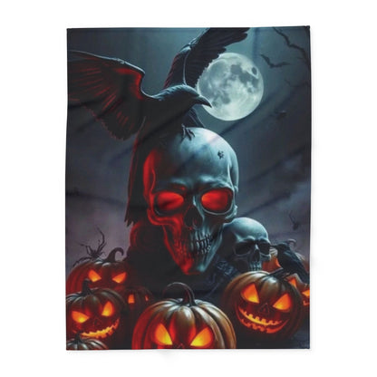 Elegant Halloween-themed Arctic fleece blanket highlighting a chilling scene with an ominous skull, bright pumpkins, and a raven, ideal for adding a sophisticated touch to your festive celebrations.