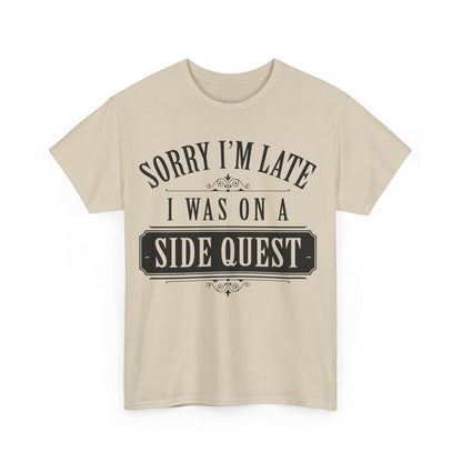 Front view of the elegant Sorry I'm Late Graphic Unisex T-Shirt - Side Quest Edition in beige, featuring a bold, decorative graphic stating 'Sorry I'm Late, I Was On A Side Quest'.