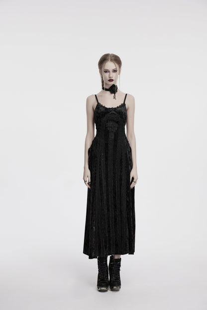 Punk Rave Morrigan black velvet slip dress displayed in an enchanting setting, ideal for gothic events and romantic evenings.