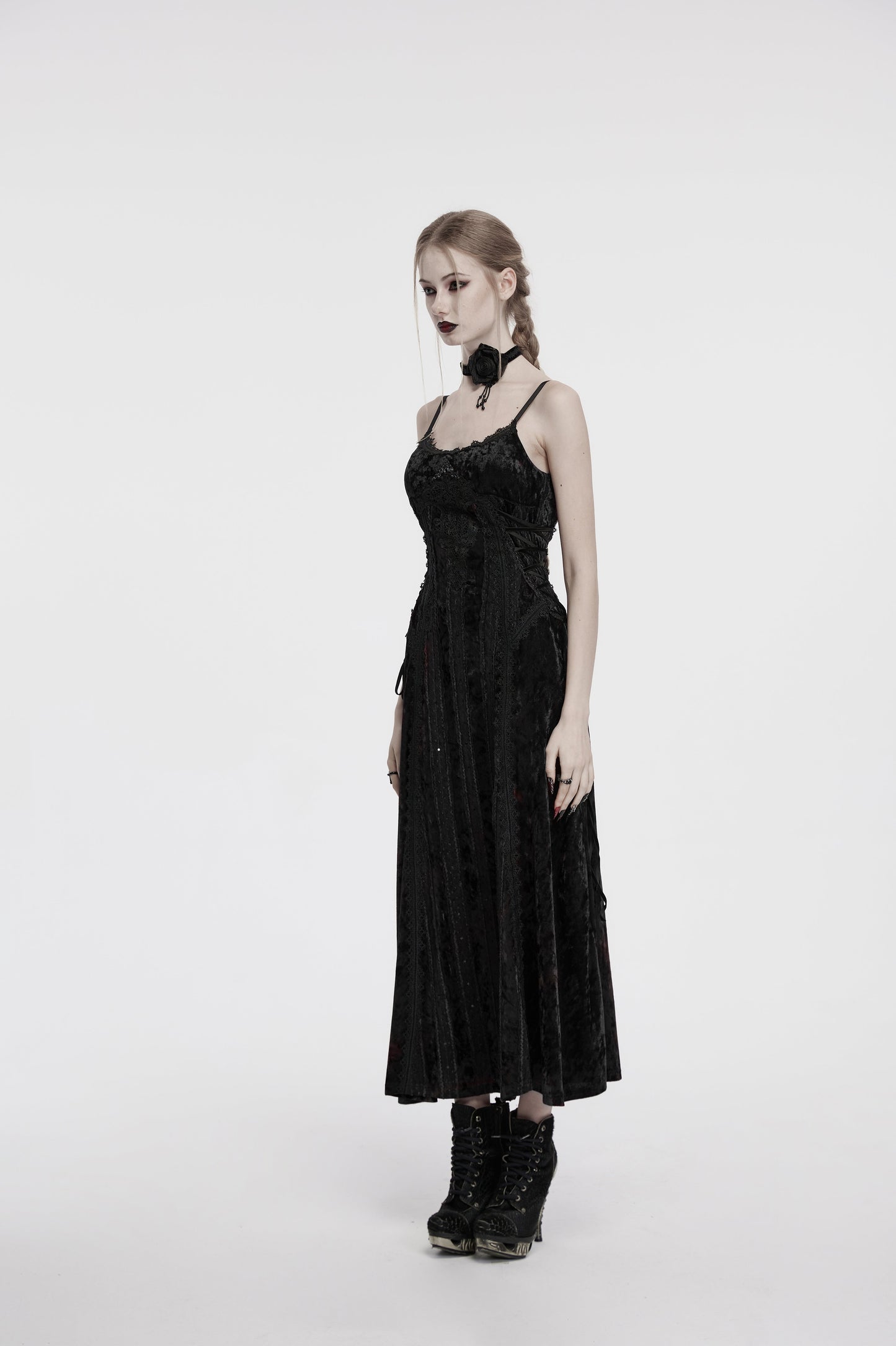 Elegant black velvet goth slip dress featuring exquisite embroidered lace trim and adjustable sides for a custom fit.