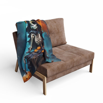 Decorative and Warm Halloween Spooky Arctic Fleece Blanket artistically draped over a chic sofa, adding a touch of Halloween elegance to interior decor.