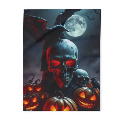 Luxurious decorative and warm Halloween spooky Arctic fleece blanket showcasing a hauntingly beautiful design featuring a skull, carved pumpkins, and a raven against a full moon backdrop.