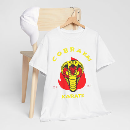 Sleek white Cobra Kai t-shirt elegantly paired with a baseball cap on a wooden chair, presenting a modern and fashionable look for martial arts fans.