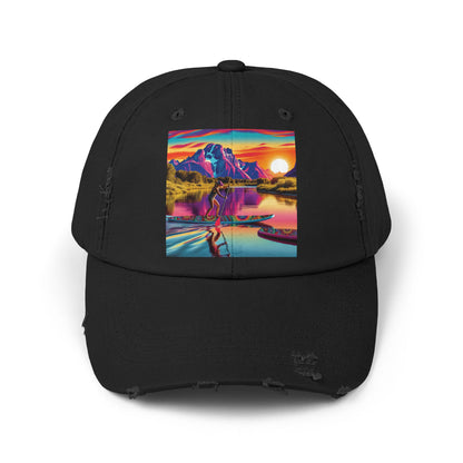 Unisex Distressed Paddleboarders Cap featuring a vibrant paddleboarding scene against a stunning sunset backdrop, perfect for adventure seekers.