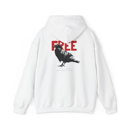 Luxury white hoodie featuring a striking raven graphic, bold red lettering stating 'YOU WERE BORN FREE', and an elegant cursive quote 'LIFE IS SHORT THE WORLD IS WIDE', showcasing artistic flair and comfort.