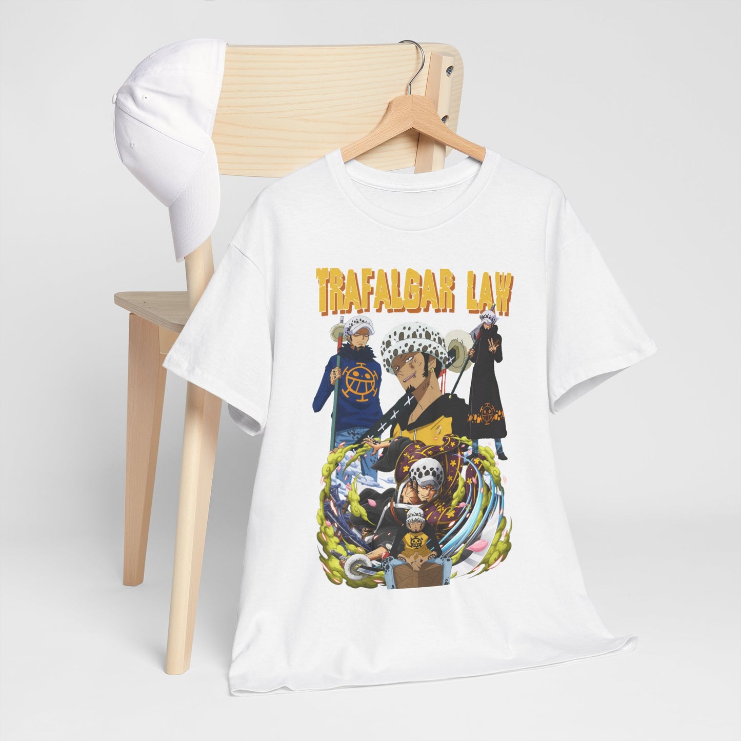 Sophisticated presentation of a Trafalgar Law mens T-shirt alongside a cap on a stylish chair, representing fashionable casual wear.