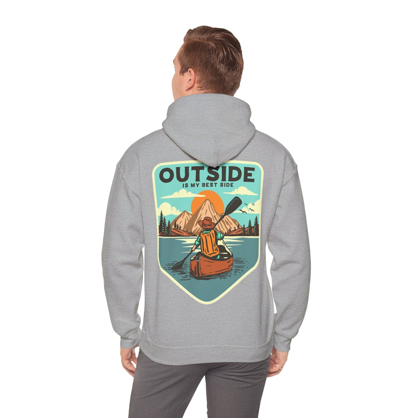 Elevate your outdoor style with this luxurious retro hoodie featuring a stunning kayaker design against a serene mountain and sunrise backdrop, showcasing the inspirational phrase 'OUTSIDE IS MY BEST SIDE'.