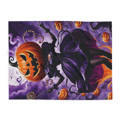 Artistic view of a decorative and warm Halloween spooky Arctic fleece blanket showcasing a captivating design with a character and pumpkins, perfect for festive decor.