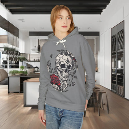 Model showcasing the front design of a Unisex Lightweight Hooded Sweatshirt with an eye-catching unique designer skull and roses print, set in a modern kitchen environment.