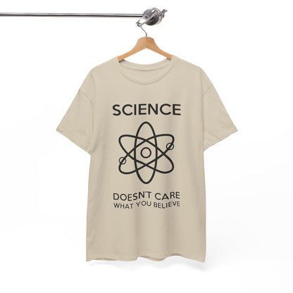 Sophisticated cream t-shirt hanging gracefully, showcasing a prominent atom illustration along with the phrase 'SCIENCE DOESN'T CARE WHAT YOU BELIEVE', embodying style and intellect.