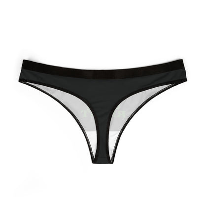Chic view of a women's thong in black, featuring the witty inscription 'TREAT YOUR GIRL RIGHT' in an eye-catching font, symbolising playful romance and luxury.
