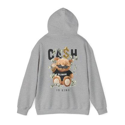 Innovative grey hoodie with a vibrant teddy bear design, surrounded by dollar bills, promoting an aura of playful luxury and casual elegance.