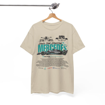 Chic beige t-shirt hung on a stylish display, featuring striking illustrations of Mercedes F1 vehicles and prestigious 'MERCEDES AMG PETRONAS' branding.