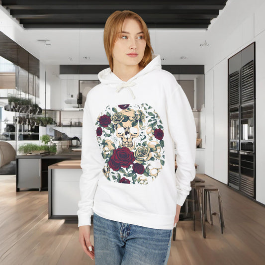 Unisex Lightweight Hooded Sweatshirt in white, adorned with a striking designer skull and roses, showcased by a model in a contemporary kitchen setting, merging luxury with bold fashion.