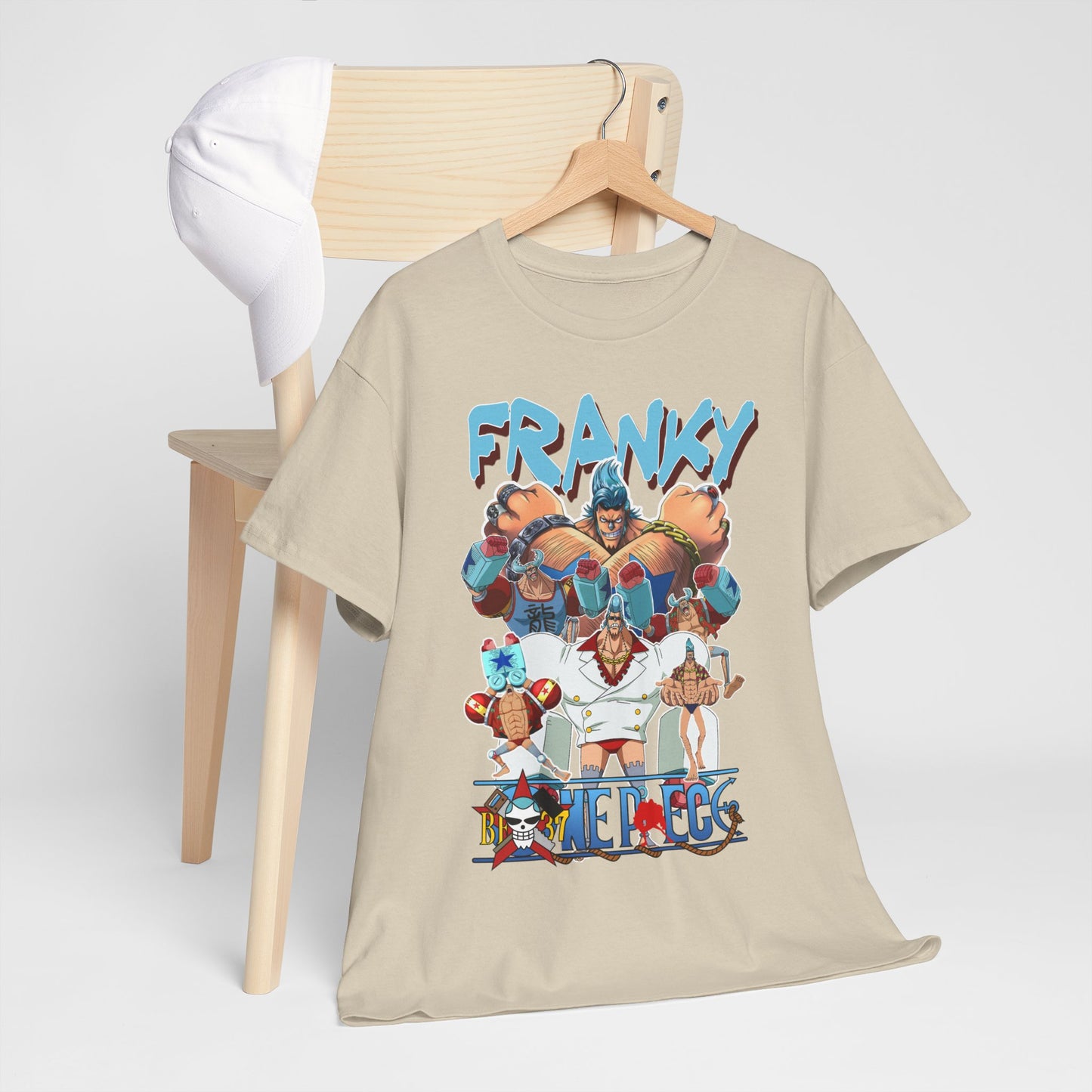 Elegant display of the Franky t-shirt alongside a cap on a wooden chair, emphasizing its chic design and versatility for casual wear.