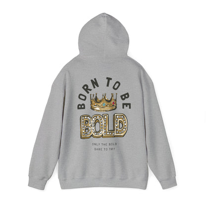 Stylish grey BORN TO BE BOLD hoodie with a golden crown and bold lettering, perfect for those who embrace individuality and luxury.