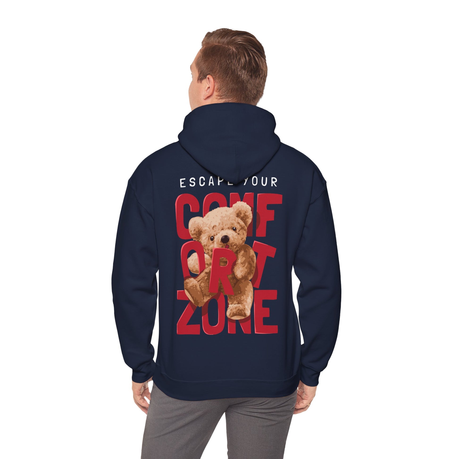 Luxurious navy hoodie featuring a whimsical teddy bear graphic and bold red text proclaiming 'ESCAPE YOUR COMFORT ZONE', designed for those seeking style and motivation.