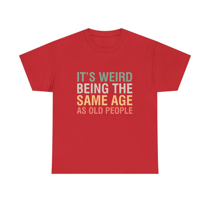 Vibrant red graphic T-shirt made from luxurious cotton, adorned with the phrase 'It's Weird Being The Same Age As Old People' for a unique fashion statement.