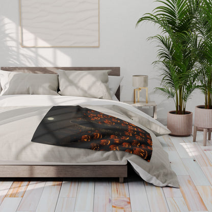 Luxurious Decorative and Warm Halloween Spooky Arctic Fleece Blanket elegantly draped over a stylish bed, featuring a captivating Halloween theme with glowing jack-o'-lanterns.