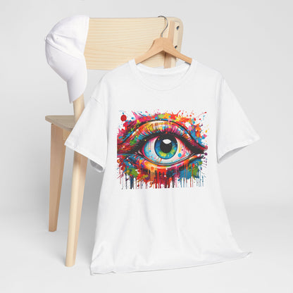 Visionary Drip graphic unisex tee showcasing a vivid eye design with colorful paint drips on a pristine white background, elegantly displayed on a minimalist chair alongside a matching hat.