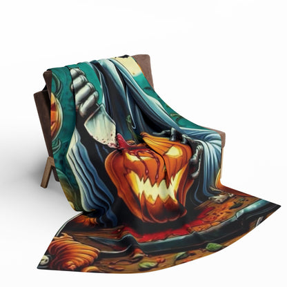 Decorative and Warm Halloween Spooky Scream Arctic Fleece Blanket elegantly displayed on a chair, featuring a haunting design ideal for creating a festive atmosphere.