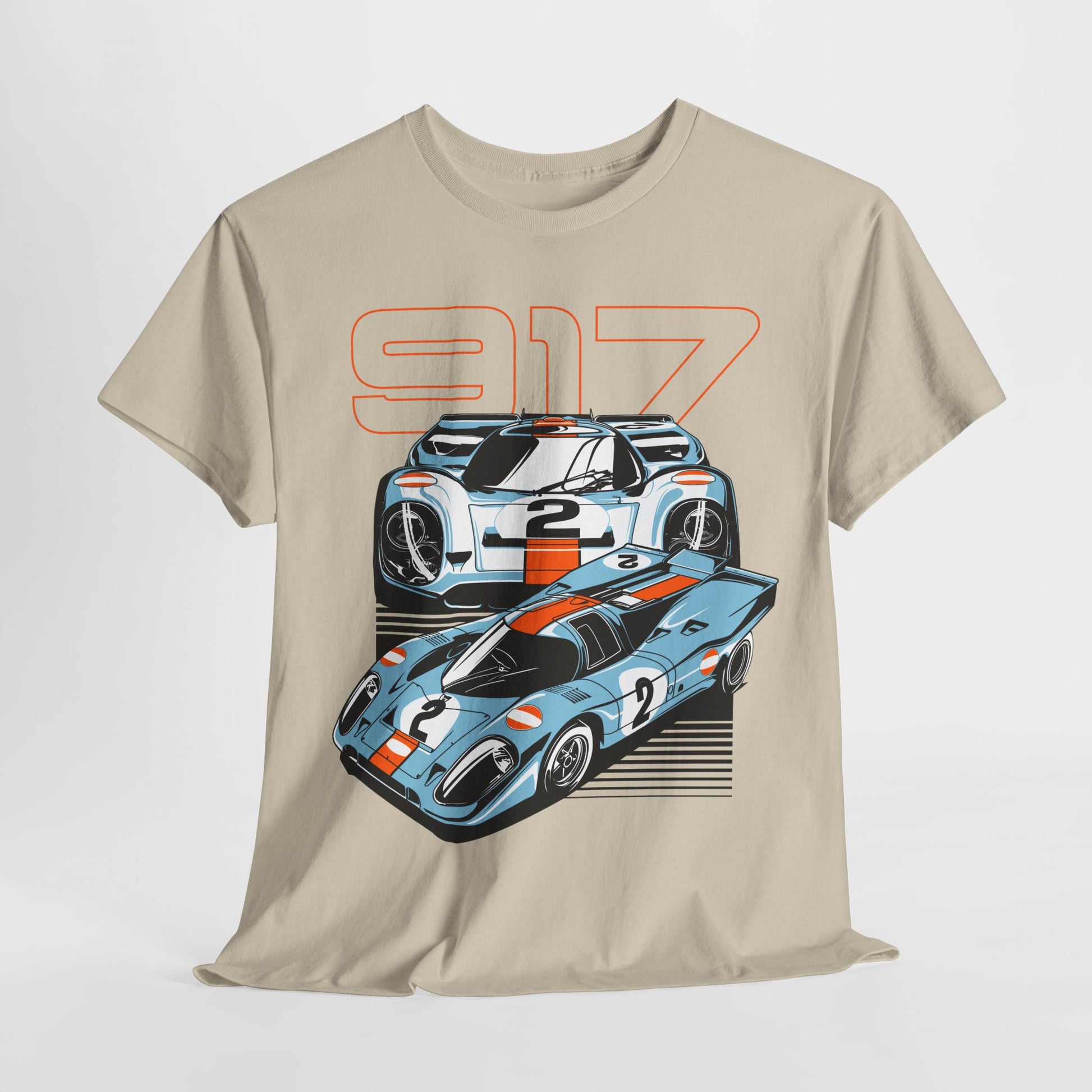 Artfully arranged beige t-shirt highlighting the sleek design of Porsche 917 race cars with an eye-catching orange and blue graphic aesthetic.
