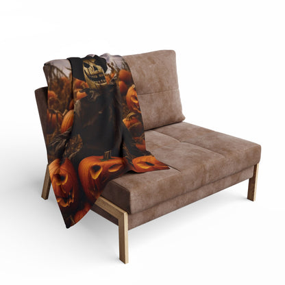 Decorative and Warm Halloween Spooky Arctic Fleece Blanket draped elegantly over a chic sofa, showcasing a vibrant pumpkin motif, perfect for adding seasonal charm to any luxury home.