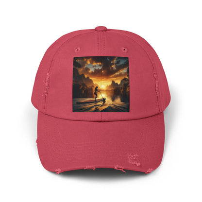 Unisex Distressed Paddleboarders Cap in sophisticated pink, showcasing a captivating sunset image, combining style and sun protection for water enthusiasts.