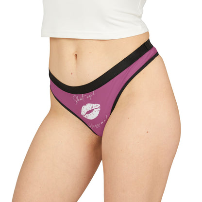 Alluring women's thong modeled on a figure, displaying the whimsical phrase 'Shut up! and kiss me!' along with a kiss graphic, perfect for adding a touch of romance to intimate moments.