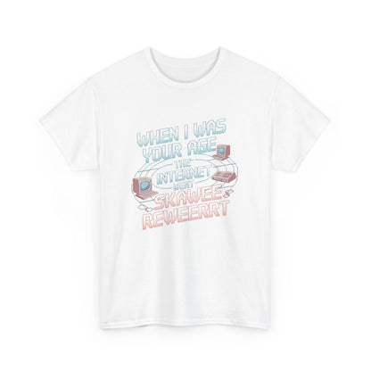 Luxurious graphic tee featuring the phrase 'When I Was Your Age the Internet Went Ska Wee Reweerrt', adorned with pixelated vintage computer illustrations, perfect for nostalgic fashion enthusiasts.