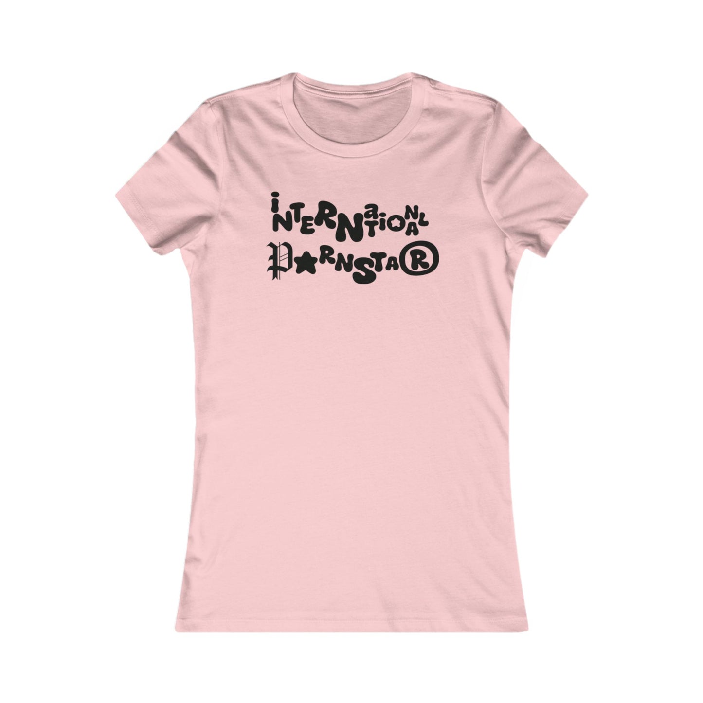 Elegant International Star T-Shirt for Women in soft pink, featuring whimsical typography, ideal for a fashionable statement.