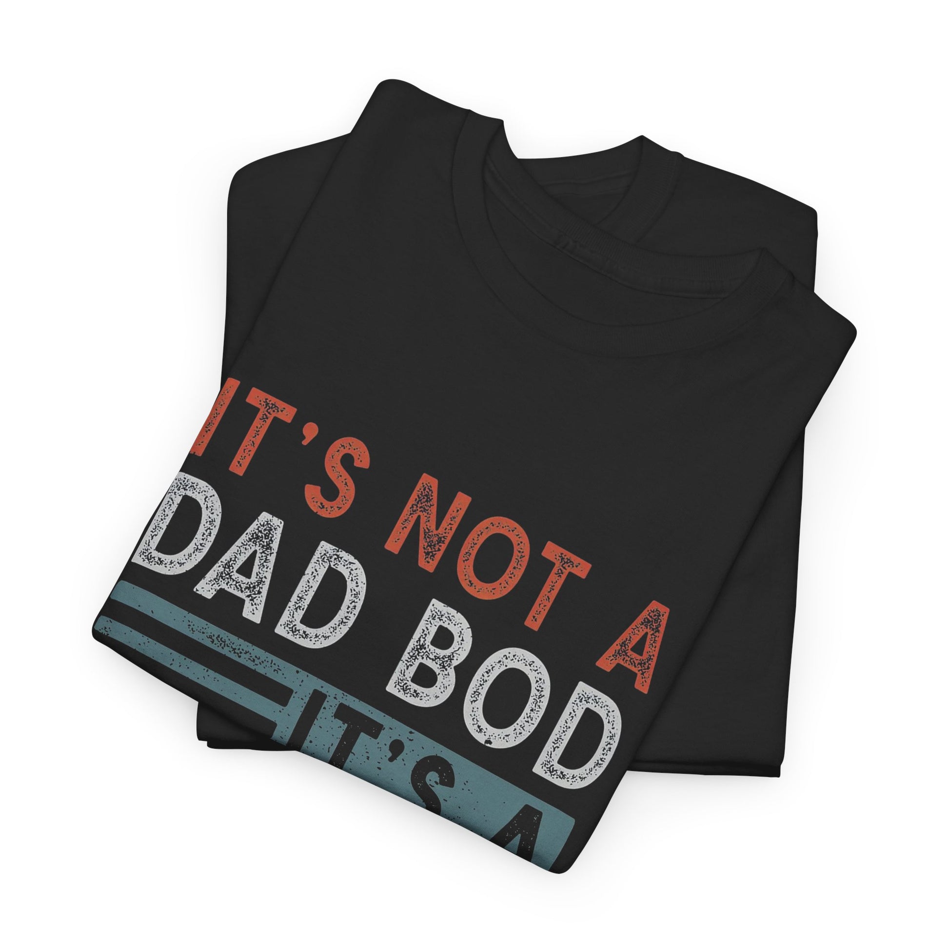 Premium black t-shirt elegantly folded, adorned with the witty statement 'It's Not A Dad Bod, It's A Father Figure' in a stylish retro design, showcasing a blend of comfort and humour.
