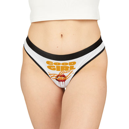 Luxury women's thong panties featuring a bold graphic design with 'Good Girl Gone Bad' in vibrant orange and seductive script, modelled to showcase its high-cut silhouette, perfect for confident lingerie lovers.