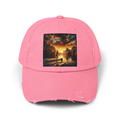 Unisex Distressed Paddleboarders Cap in a striking pink shade, adorned with an artistic sunset paddleboarding design, offering exceptional sun protection for those embracing water adventures.