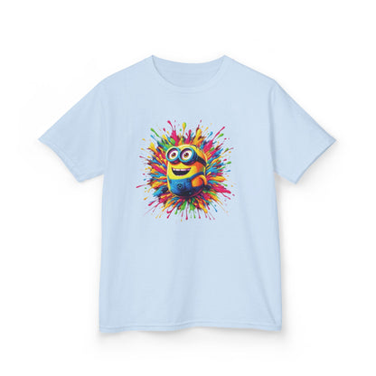 A Kids Minion Paint Splash T Shirt displayed in light blue, featuring a cute Minion character surrounded by a burst of vibrant paint splashes. This Funny T Shirt is a must-have for young Minions fans.