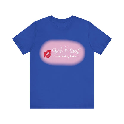 Sabrina Carpenter Inspired Unisex Short Sleeve Tee with Vibrant Lipstick Print in royal blue, adorned with the phrase 'Short n sweet, I'm working Late...' highlighted by a striking lipstick image.