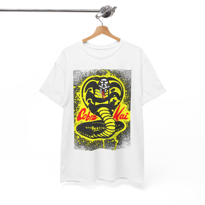 Stylish hanging Cobra Kai unisex t-shirt featuring a captivating snake motif in bright yellow and black, highlighting contemporary design combined with martial arts inspiration.