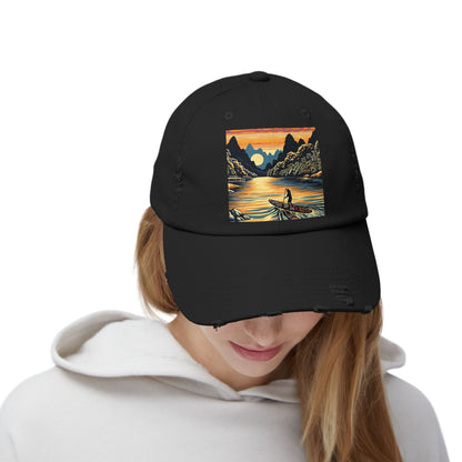 Woman wearing Unisex Distressed Paddleboarders Cap with Fantasy Design in black, featuring a captivating paddleboarding sunset illustration, perfect for stylish outdoor adventures.