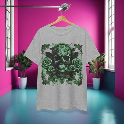 Skulls and Roses Cotton Tee showcased in a chic pink setting, featuring the eye-catching green skull and rose print, ideal for alternative fashion lovers.