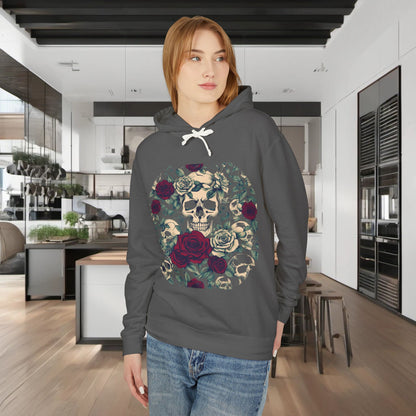 Model wearing a Unisex Lightweight Hooded Sweatshirt featuring exclusive designer skull and roses artwork, set in a stylish modern kitchen.