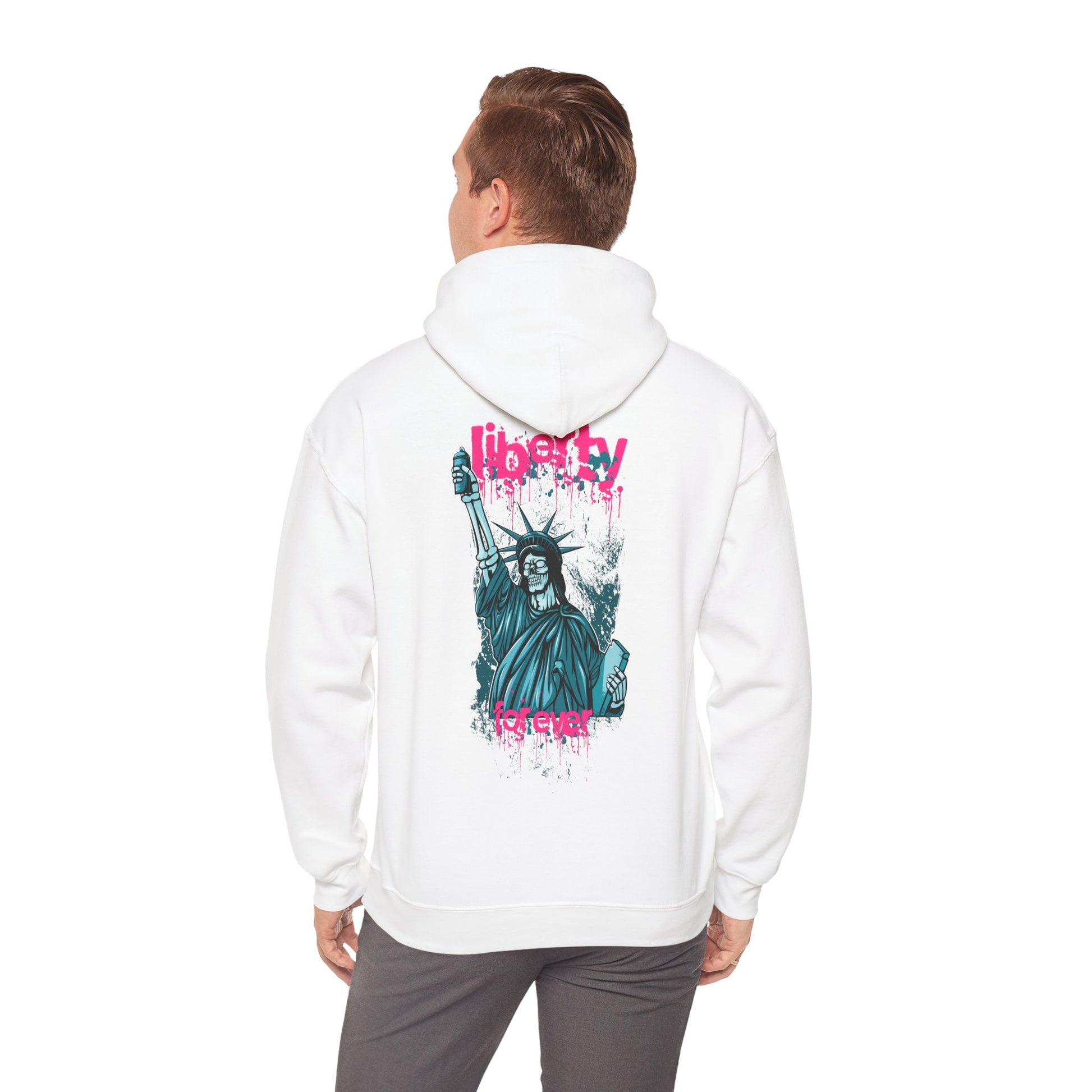Elegant white hoodie featuring a rebellious urban design of the Statue of Liberty, with pink graffiti text saying 'liberty forever' in vibrant turquoise tones.