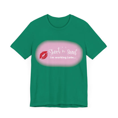 Sabrina Carpenter Inspired Unisex Short Sleeve Tee featuring a vibrant lipstick print on a refreshing green backdrop. This chic t-shirt blends elegance with artistry, making it a must-have fashion statement.