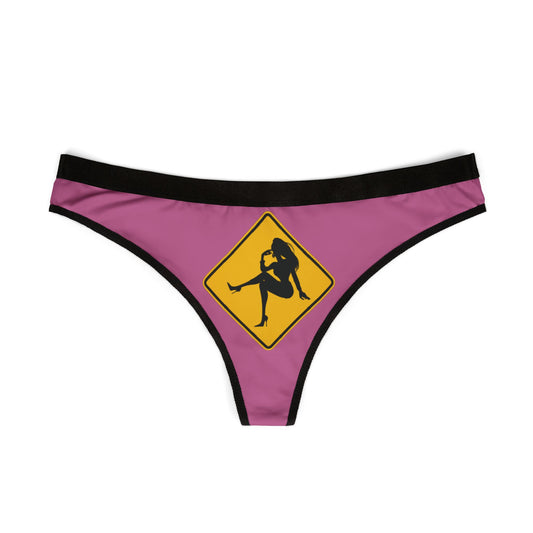 Elegant pink women's thong adorned with a cheeky graphic, ideal for adding a touch of humour to your intimate wear collection.