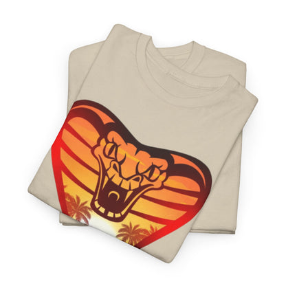 Exquisite folded Cobra Kai t-shirt displaying a fierce snake emblem against a background of sunset hues, ideal for stylish casual wear.