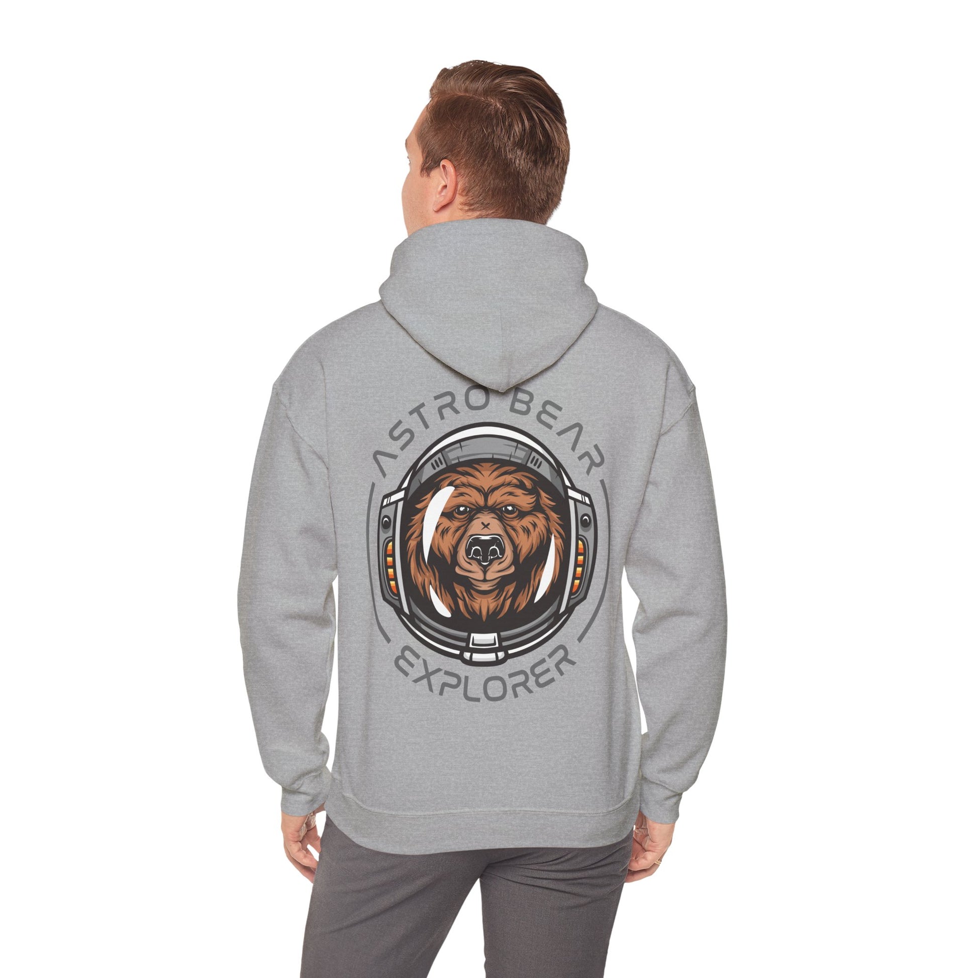 Man wearing a stylish grey hoodie with an intricate astronaut bear design at the back, perfect for adventurous souls.