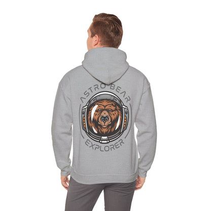 Man wearing a stylish grey hoodie with an intricate astronaut bear design at the back, perfect for adventurous souls.